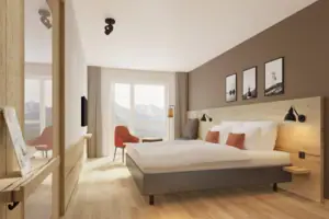 Hotelzimmer Schlafzimmer mit Bett und Stuhl