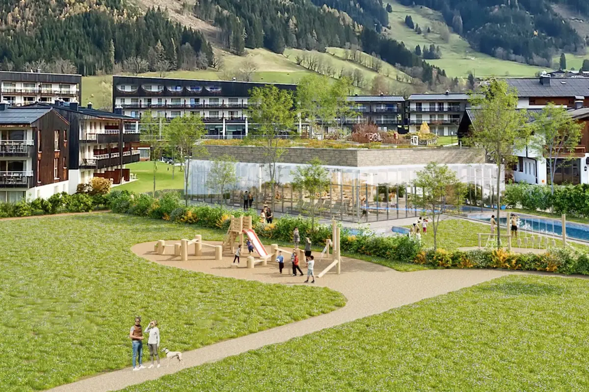 Spiel und Spass Eine Gruppe von Menschen spielt in einem Park mit einem Spielplatz im Vordergrund.